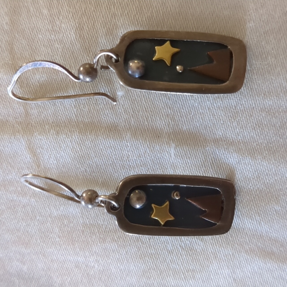 Silver wire earrings.